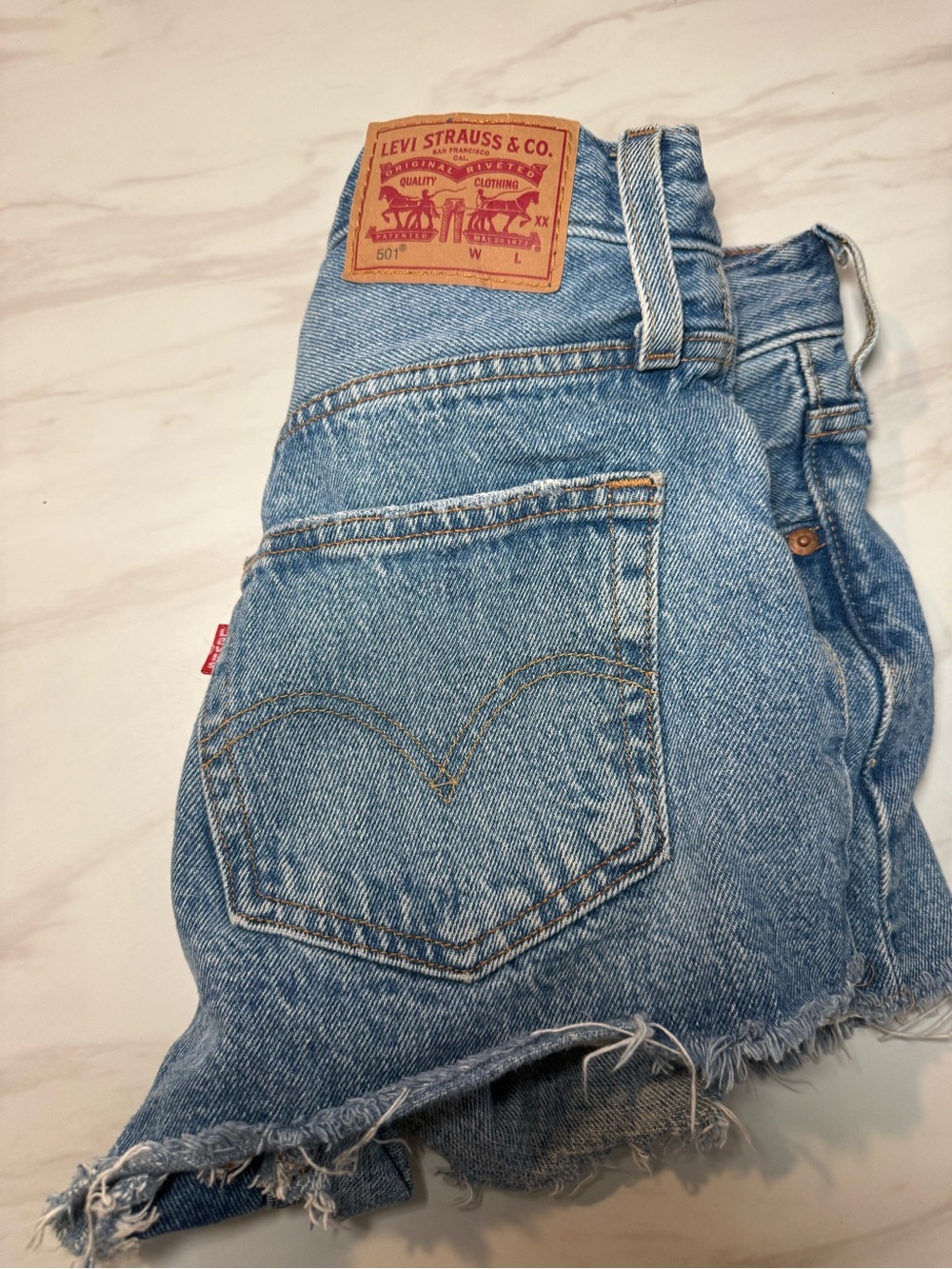 Levi's Blue Denim Cutoff Shorts with Frayed Hem
